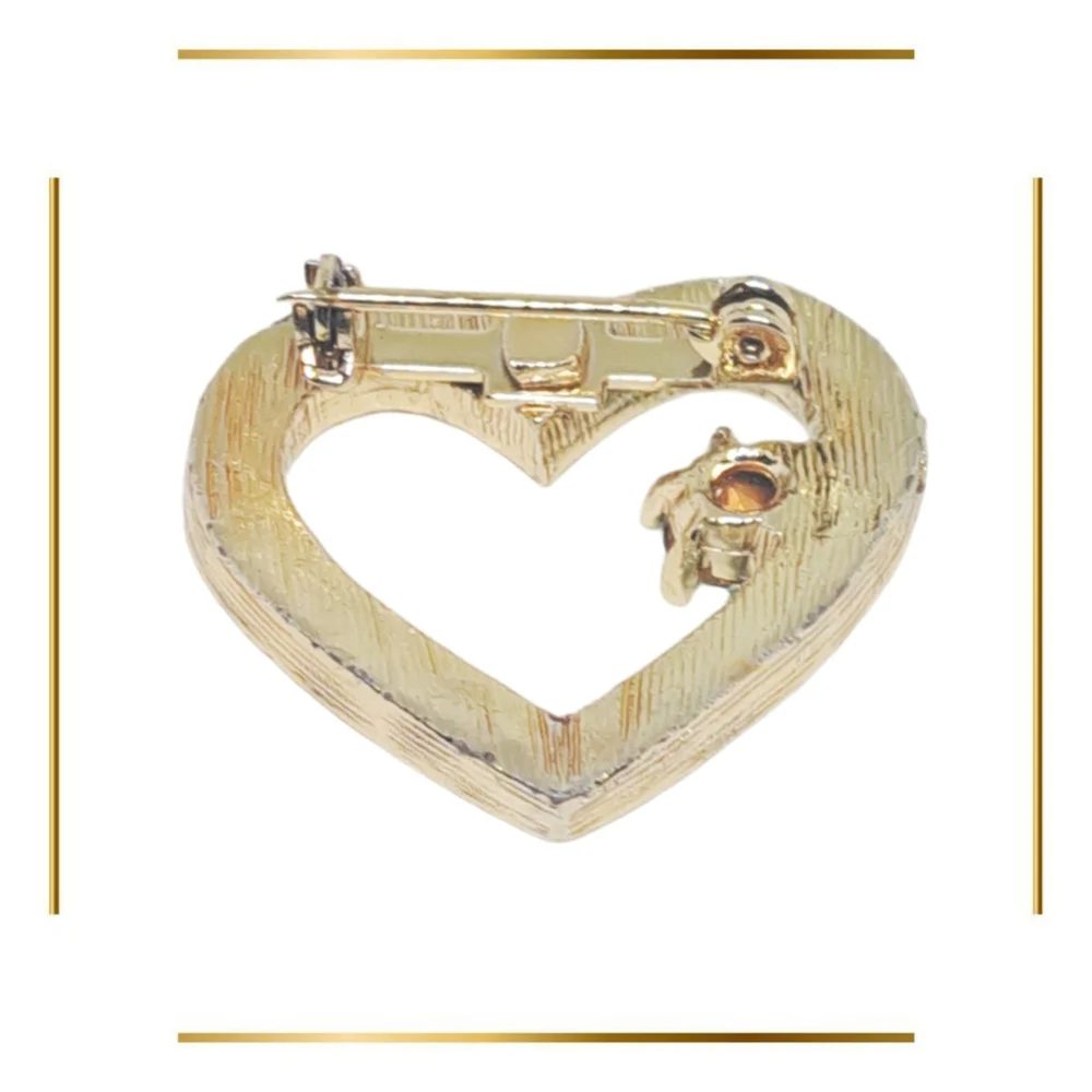 Gold Tone Heart Shaped Brooch with Blue Rhinestones